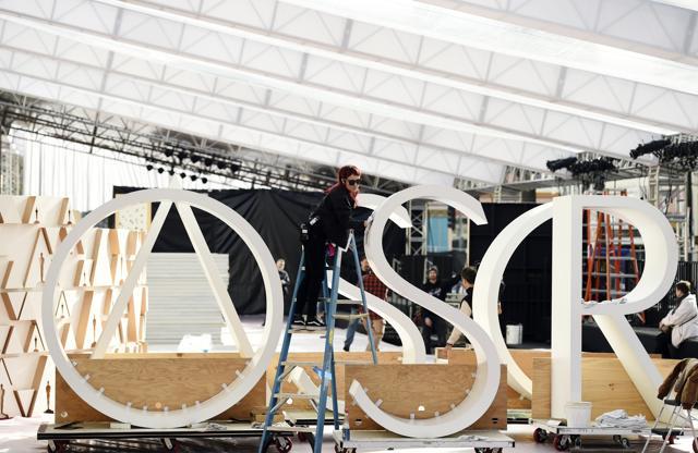Crew worker Andee Allen polishes Oscar letters in preparation for Sunday's 92nd Academy Awards at the Dolby Theatre. (Chris Pizzello/Invision/AP) Crew worker Andee Allen polishes Oscar letters in preparation for Sunday's 92nd Academy Awards at the Dolby Theatre. (Chris Pizzello/Invision/AP)