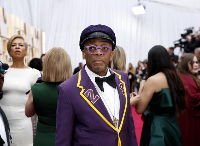 Director Spike Lee, wearing a coat with the number 24 in memory of NBA player Kobe Bryant, poses on the red carpet during the Oscars arrivals at the 92nd Academy Awards in Hollywood, Los Angeles, California. (REUTERS) Director Spike Lee, wearing a coat with the number 24 in memory of NBA player Kobe Bryant, poses on the red carpet during the Oscars arrivals at the 92nd Academy Awards in Hollywood, Los Angeles, California. (REUTERS)