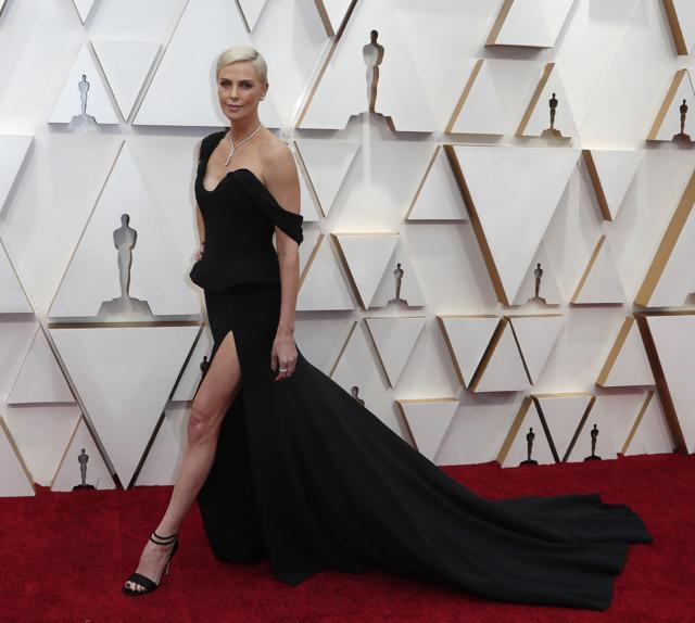 Charlize Theron poses on the red carpet during the Oscars arrivals at the 92nd Academy Awards in Hollywood, Los Angeles, California. (REUTERS) Charlize Theron poses on the red carpet during the Oscars arrivals at the 92nd Academy Awards in Hollywood, Los Angeles, California. (REUTERS)