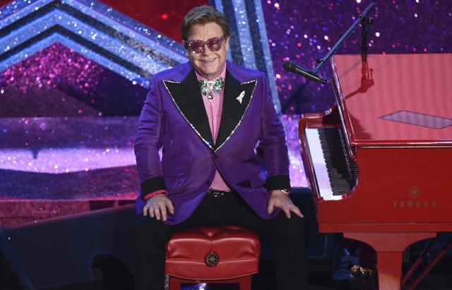 Elton John is seen after performing (I'm Gonna) Love Me Again nominated for the award for best original song from Rocketman at the Oscars. (Chris Pizzello/Invision/AP) Elton John is seen after performing (I'm Gonna) Love Me Again nominated for the award for best original song from Rocketman at the Oscars. (Chris Pizzello/Invision/AP)