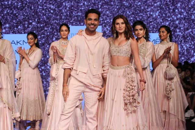 Tara Sutaria with fashion designer Punit Balana on Day 5 of the Lakme Fashion Week Summer/Resort 2020. (IANS) Tara Sutaria with fashion designer Punit Balana on Day 5 of the Lakme Fashion Week Summer/Resort 2020. (IANS)