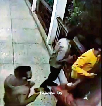 Video 1 shows masked men in police and security uniforms enter the Jamia library and baton-charge students, purportedly during the December 15 crackdown; Videos 2 and 3 show a suspected rioter carrying a stone in the library, and a group of people, some carrying stones, in a campus corridor. The chronology of the videos is unclear Video 1 shows masked men in police and security uniforms enter the Jamia library and baton-charge students, purportedly during the December 15 crackdown; Videos 2 and 3 show a suspected rioter carrying a stone in the library, and a group of people, some carrying stones, in a campus corridor. The chronology of the videos is unclear