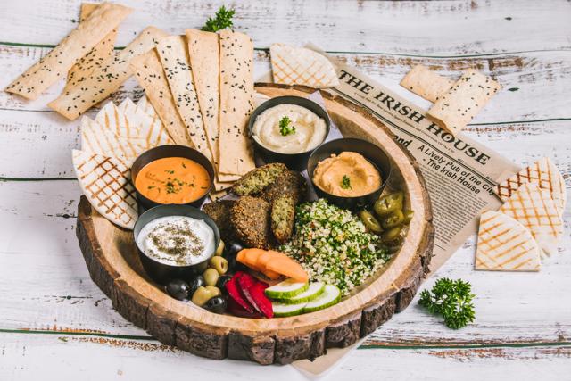 The Mediterranean Market, containing hummus and pita bread, as a part of the new menu at The Irish House The Mediterranean Market, containing hummus and pita bread, as a part of the new menu at The Irish House