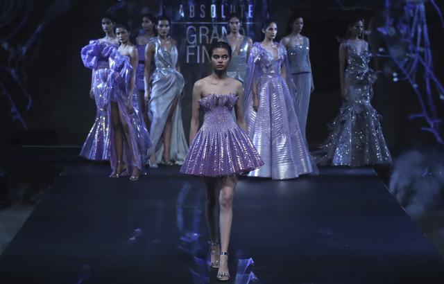 Models displays a creation by Amit Aggarwal at the grand finale during Lakme Fashion Week in Mumbai, India, Sunday. (AP) Models displays a creation by Amit Aggarwal at the grand finale during Lakme Fashion Week in Mumbai, India, Sunday. (AP)
