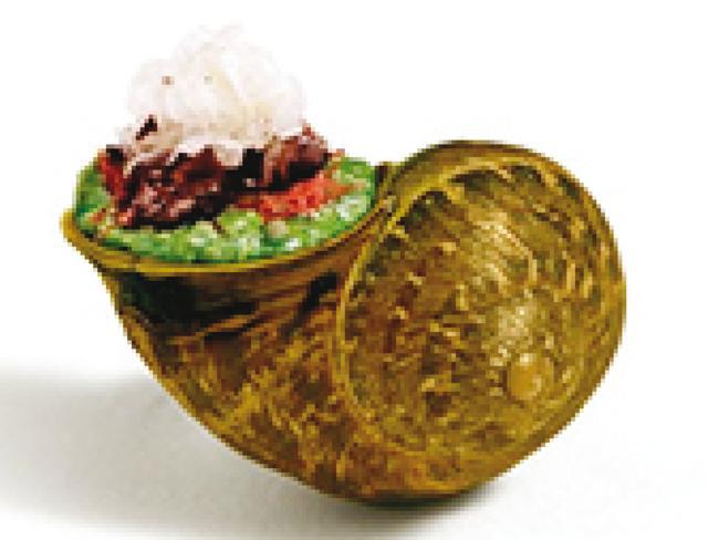 Snail porridge is one the chef’s signature dishes Snail porridge is one the chef’s signature dishes