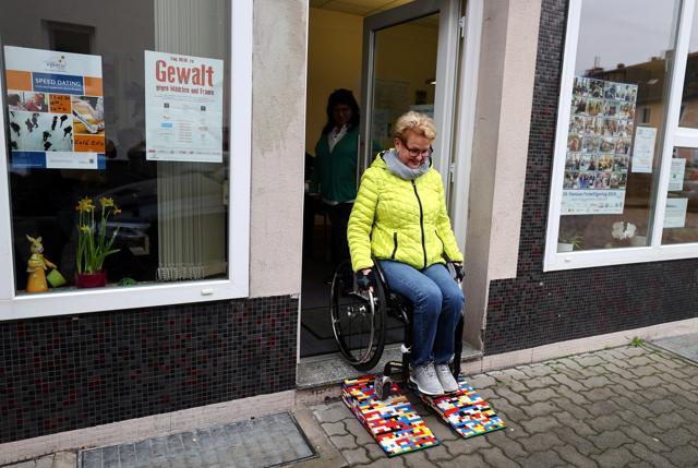 Rita Ebel, nicknamed "Lego grandma", tests one of her wheelchair ramps built from donated Lego bricks. (REUTERS) Rita Ebel, nicknamed "Lego grandma", tests one of her wheelchair ramps built from donated Lego bricks. (REUTERS)
