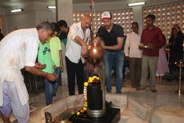 Rakesh Roshan and Hrithik Roshan celebrating Mahashivratri. Rakesh Roshan and Hrithik Roshan celebrating Mahashivratri.
