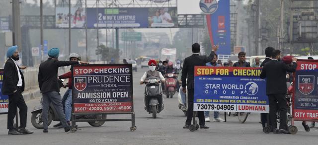 Lawyers blocking the roads at Bharat Nagar Chowk in Ludhiana on Friday. (Gurpreet Singh/HT)