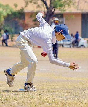 A player of BVB Paranjape school misfields against Sardar Dastur high school at the Law college ground during the PDCA u-14 match on Monday. (Sanket Wankhade/HT PHOTO)