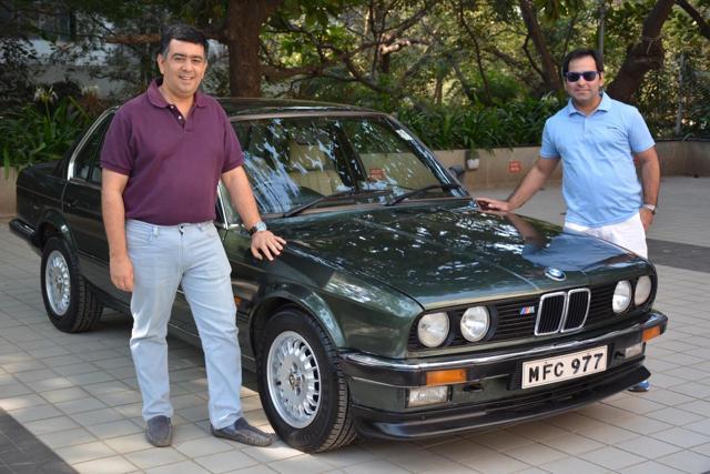 Hormazd Sorabjee (left) and Perseus Bandrawalla with the 1986 BMW series E30 325I.