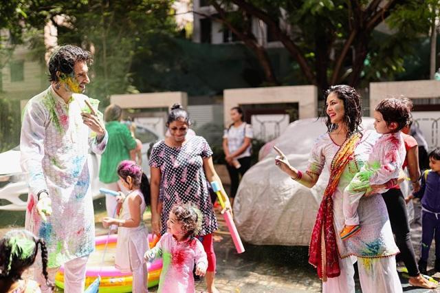 Sunny Leone and family play with colours during Holi bash. Sunny Leone and family play with colours during Holi bash.