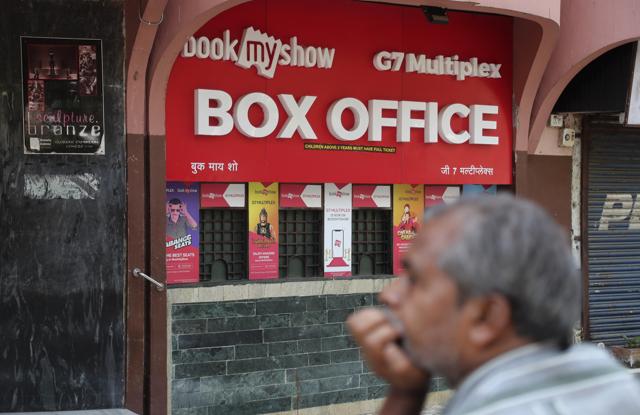 A man stands outside a Multiplex after authorities closed cinemas as a precautionary measure against COVID-19 in Mumbai. (AP) A man stands outside a Multiplex after authorities closed cinemas as a precautionary measure against COVID-19 in Mumbai. (AP)