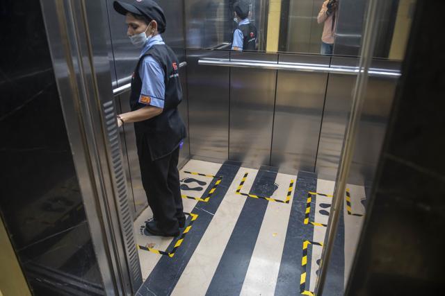 Foot marks in elevator to ensure social distancing. Foot marks in elevator to ensure social distancing.