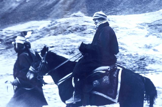 The Dalai Lama fleeing Tibet on horseback into exile in India in March 1959. (Francis Apesteguy/Getty Images) The Dalai Lama fleeing Tibet on horseback into exile in India in March 1959. (Francis Apesteguy/Getty Images)