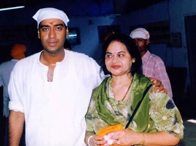 An old picture of Ajay with his mother.