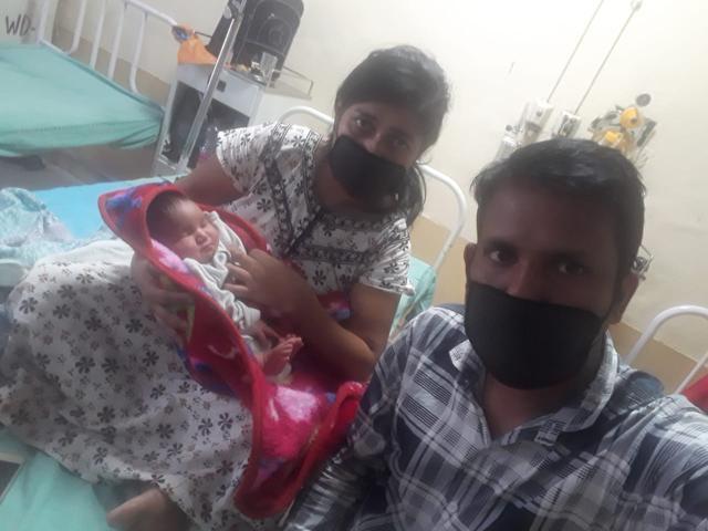 Geetanjali and Pankaj Kumar Sharma take a selfie with their newborn. Geetanjali and Pankaj Kumar Sharma take a selfie with their newborn.