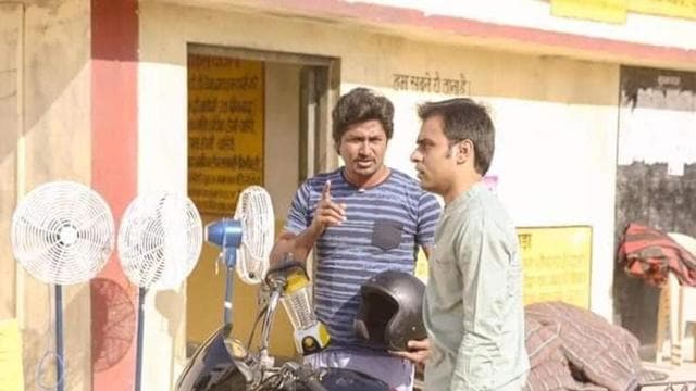 Chandan Roy (Vikas) with Jitendra Kumar (lead actor) (A still from the web-series)