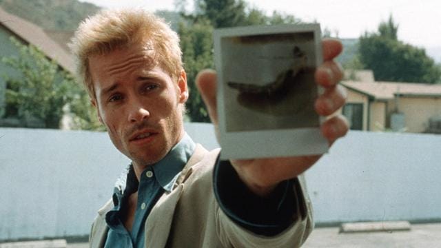 Guy Pearce in a still from Memento. Guy Pearce in a still from Memento.