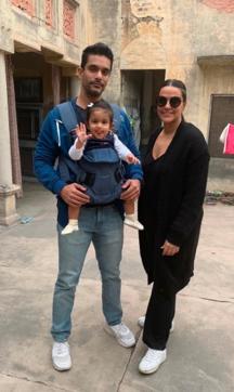 Neha Dhupia and husband Angad Bedi with daughter Mehr Neha Dhupia and husband Angad Bedi with daughter Mehr
