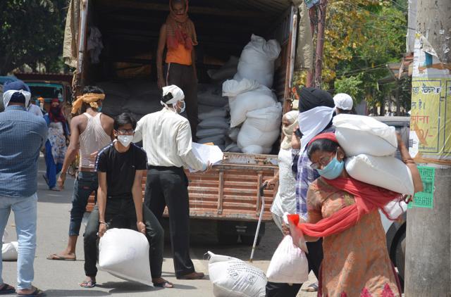 PDS beneficiaries collecting free wheat in Chandigarh. (Sant Arora/HT) PDS beneficiaries collecting free wheat in Chandigarh. (Sant Arora/HT)