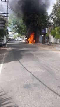 The car was parked on the roadside near the DMCH when it caught fire. (HT Photo)