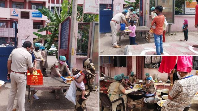 Food being distributed outside the police station. Food being distributed outside the police station.