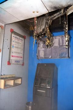 The ATM machine and the cash inside it were safe, while the air conditioner and the down ceiling installed in the cabin got damaged in the fire. (HT Photo)
