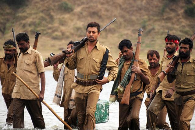 Irrfan Khan in Paan Singh Tomar. Nawazuddin Sidiqqui is to his right.