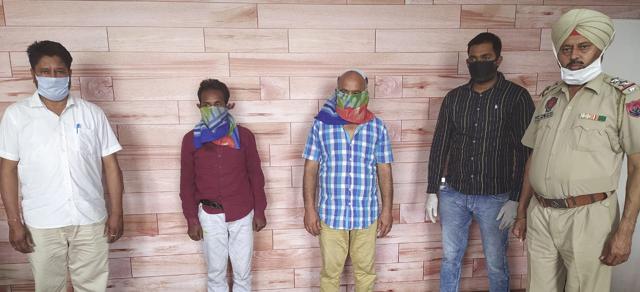The two drug peddlers (second and third from left) arrested from Transport Nagar in custody of Ludhiana STF on Thursday. (HT Photo) The two drug peddlers (second and third from left) arrested from Transport Nagar in custody of Ludhiana STF on Thursday. (HT Photo)