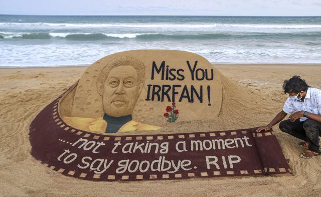 Puri: Sand artist Sudarsan Pattnaik pays tribute to Bollywood actor Irrfan Khan with his sand art creation on the Puri beach. (PTI) Puri: Sand artist Sudarsan Pattnaik pays tribute to Bollywood actor Irrfan Khan with his sand art creation on the Puri beach. (PTI)