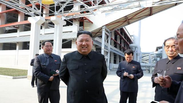 This picture taken on May 1, 2020 and released from North Korea's official Korean Central News Agency (KCNA) on May 2, 2020 shows North Korean leader Kim Jong Un (2nd L) (AFP /KCNA via KNS)