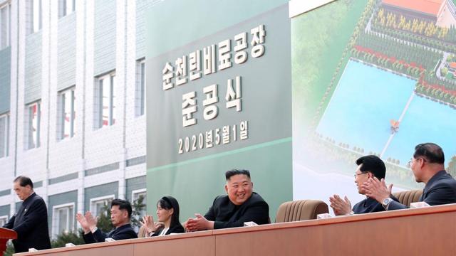 This picture taken on May 1, 2020 and released from North Korea's official Korean Central News Agency (KCNA) on May 2, 2020 shows North Korean leader Kim Jong Un (3rd R) attending a ceremony to mark the completion of Sunchon phosphatic fertilizer factory in South Pyongan Province, North Korea. (AFP Photo / KCNA via KNS)