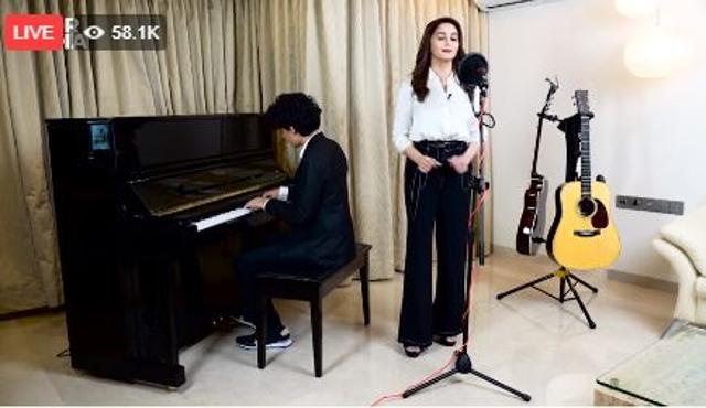 Madhuri performs with her son.