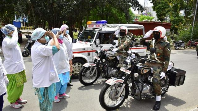 Indian Army saluting the medical staff to thank them for their hard work during the coronavirus outbreak at Guru Nanak Dev Hospital in Amritsar on Sunday.  (HT Photo/Sameer Sehgal Hindustan Times)