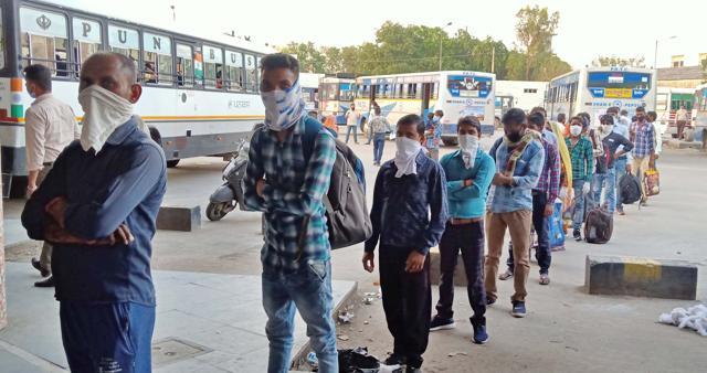 Passengers await their turn for screening at the Ludhiana ISBT before being taken to the local railway station. (HT Photo) Passengers await their turn for screening at the Ludhiana ISBT before being taken to the local railway station. (HT Photo)