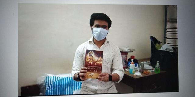 A student holding a Bhagavad Gita that he is reading amid the coronavirus lockdown, at Punjab Agricultural University in Ludhiana on Thursday. (HT Photo) A student holding a Bhagavad Gita that he is reading amid the coronavirus lockdown, at Punjab Agricultural University in Ludhiana on Thursday. (HT Photo)