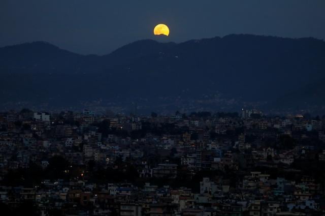 The full moon, also known as the Supermoon or Flower Moon, rises above the Kathmandu Valley, as the lockdown imposed by the government over concerns about the spread of the coronavirus disease (COVID-19) continues for the forty-fifth day in Kathmandu, Nepal May 7, 2020. REUTERS/Navesh Chitrakar (REUTERS) The full moon, also known as the Supermoon or Flower Moon, rises above the Kathmandu Valley, as the lockdown imposed by the government over concerns about the spread of the coronavirus disease (COVID-19) continues for the forty-fifth day in Kathmandu, Nepal May 7, 2020. REUTERS/Navesh Chitrakar (REUTERS)
