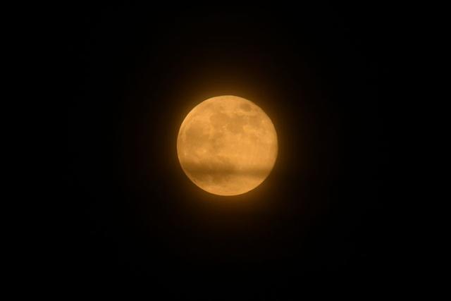 The full moon, also known as the Supermoon or Flower Moon rises over Foxhill, Tetbury, London, Britain, May 7, 2020. REUTERS/Dylan Martinez (REUTERS) The full moon, also known as the Supermoon or Flower Moon rises over Foxhill, Tetbury, London, Britain, May 7, 2020. REUTERS/Dylan Martinez (REUTERS)