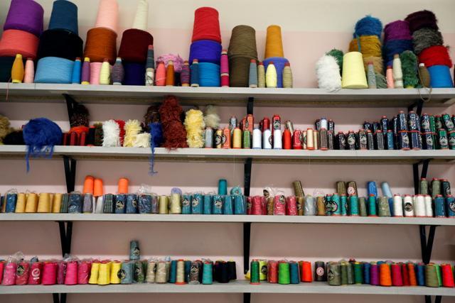 Reels of thread are seen at Bokja's atelier, which specialises in making upholstered furniture and now is dedicating their time to sewing colourful silk face masks, in Beirut, Lebanon May 7, 2020. Picture taken May 7, 2020. REUTERS/Mohamed Azakir (REUTERS) Reels of thread are seen at Bokja's atelier, which specialises in making upholstered furniture and now is dedicating their time to sewing colourful silk face masks, in Beirut, Lebanon May 7, 2020. Picture taken May 7, 2020. REUTERS/Mohamed Azakir (REUTERS)
