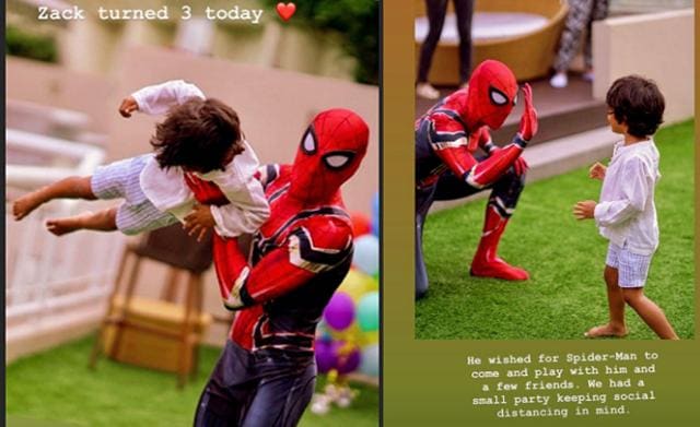 Zack Lalvani plays with Spider-Man.