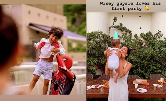 Zack with Spider-Man and Lisa Haydon with Leo at the party.