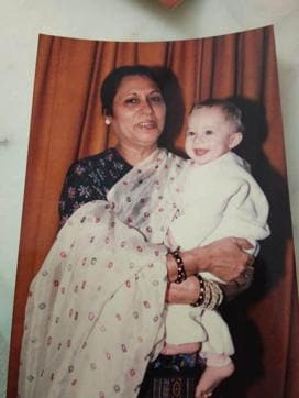 With my grandmother as a baby. With my grandmother as a baby.