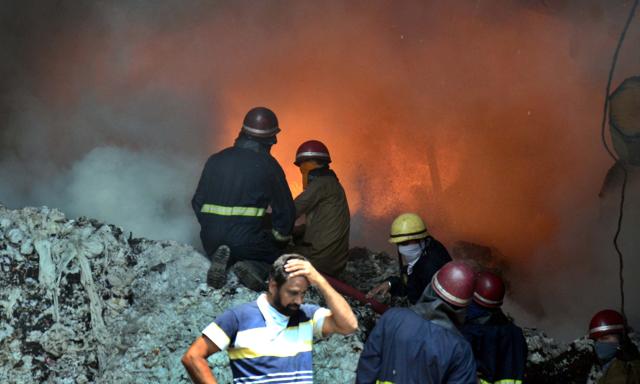 Firefighters trying to control the blaze at the woollen mill godown on RK Road near Cheema Chowk in Ludhiana on Sunday. (GURPREET SINGH/HT) Firefighters trying to control the blaze at the woollen mill godown on RK Road near Cheema Chowk in Ludhiana on Sunday. (GURPREET SINGH/HT)