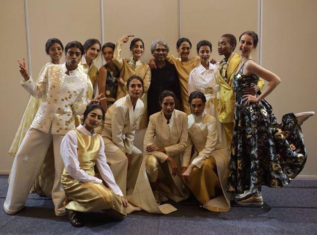 Designer Rajesh Pratap Singh with models after a showcase Designer Rajesh Pratap Singh with models after a showcase