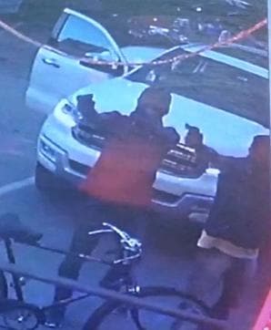 A CCTV grab of the assailants opening fire.