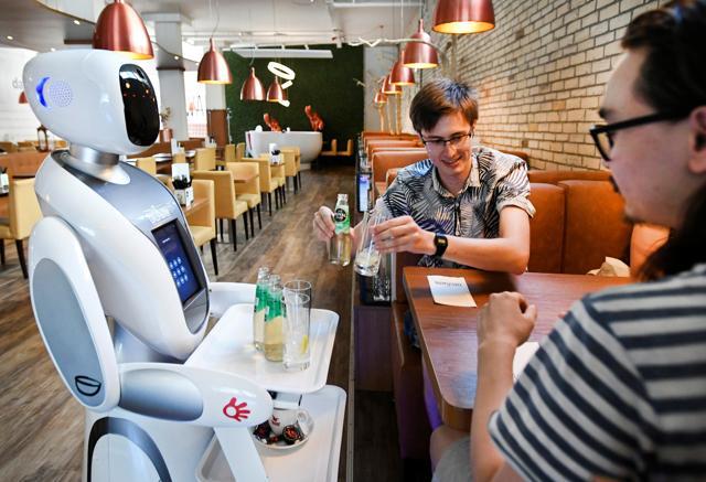 A robot serves in a Chinese restaurant to reduce the risk of spreading the coronavirus disease (COVID-19) in Maastricht, Netherlands. (REUTERS) A robot serves in a Chinese restaurant to reduce the risk of spreading the coronavirus disease (COVID-19) in Maastricht, Netherlands. (REUTERS)
