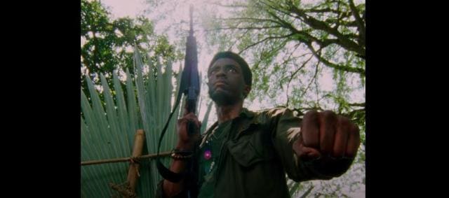 Chadwick Boseman in a flashback scene from Spike Lee’s Da 5 Bloods.