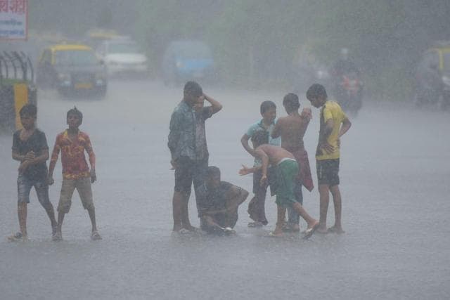 Children playing in the rain in Mumbai on Thursday. (Vijayanand Gupta/HT Photo ) Children playing in the rain in Mumbai on Thursday. (Vijayanand Gupta/HT Photo )
