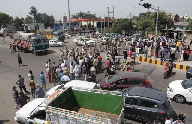 Protesters gathered at the Jammu-Pathankot national highway near Gangyal area on Saturday. (HT Photo) Protesters gathered at the Jammu-Pathankot national highway near Gangyal area on Saturday. (HT Photo)