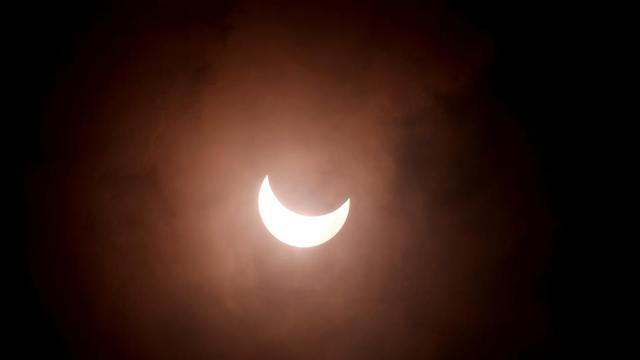 A partial solar eclipse is seen from Rajpath in New Delhi, India, June 21, 2020. REUTERS/Adnan Abidi (REUTERS) A partial solar eclipse is seen from Rajpath in New Delhi, India, June 21, 2020. REUTERS/Adnan Abidi (REUTERS)
